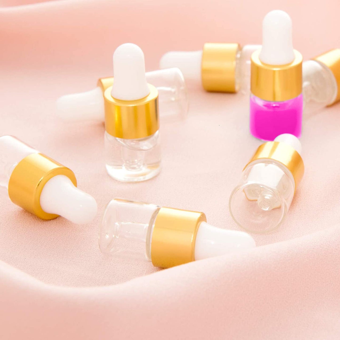 Yalbdopo 24Pcs, 1Ml Clear Glass Sample Dropper Bottles, Empty Mini Bottles with Dropper Pipettes Rose Gold Aluminum Alloy Cap Refillable Sample Container for Essential Oil Perfume Cosmetic Liquid Transparent Glass Rose Golden Cap