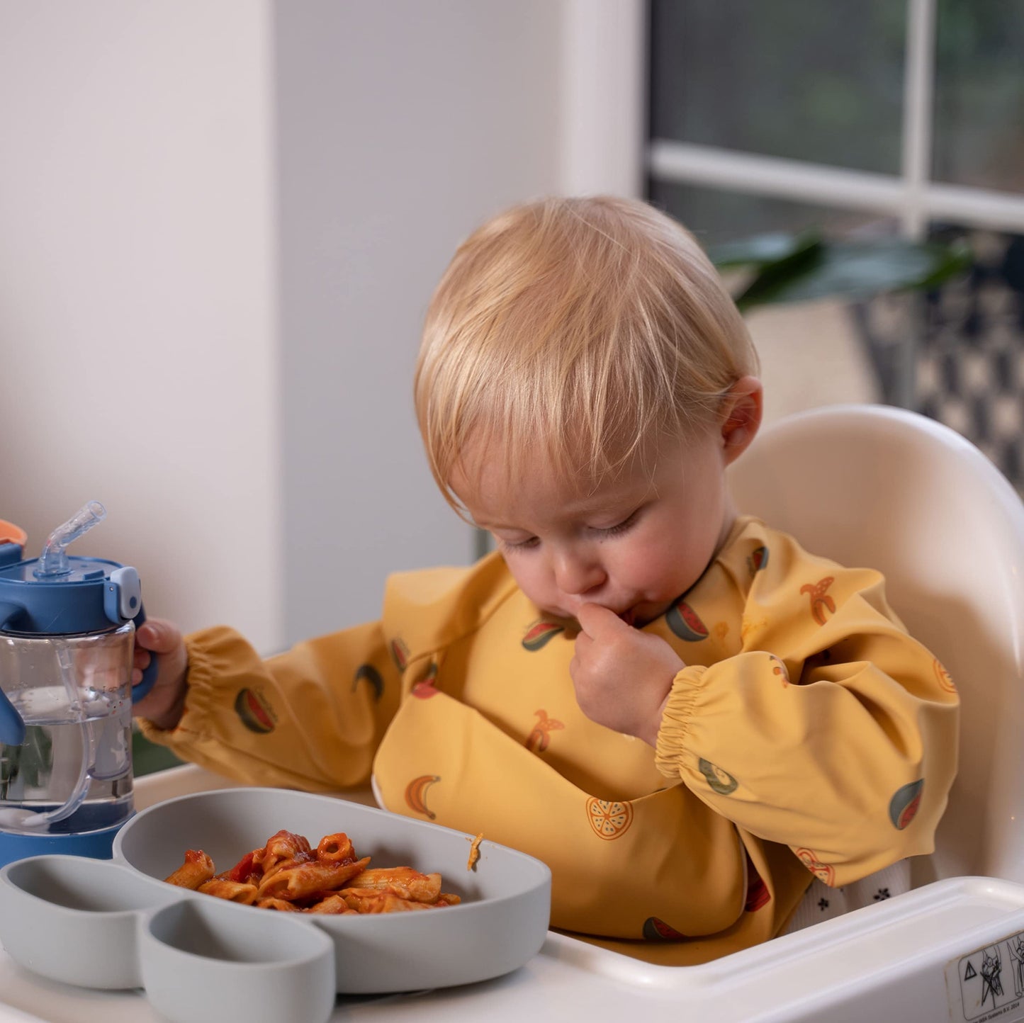 ÜneeQbaby Waterproof Baby and Toddler Bibs - Pack of 2, Long Sleeve Oeko-TEX for Feeding and Messy Play with Chest Pocket, Coverall Mock Small (6-18 Months) Yellow Fruits, off white Sweets